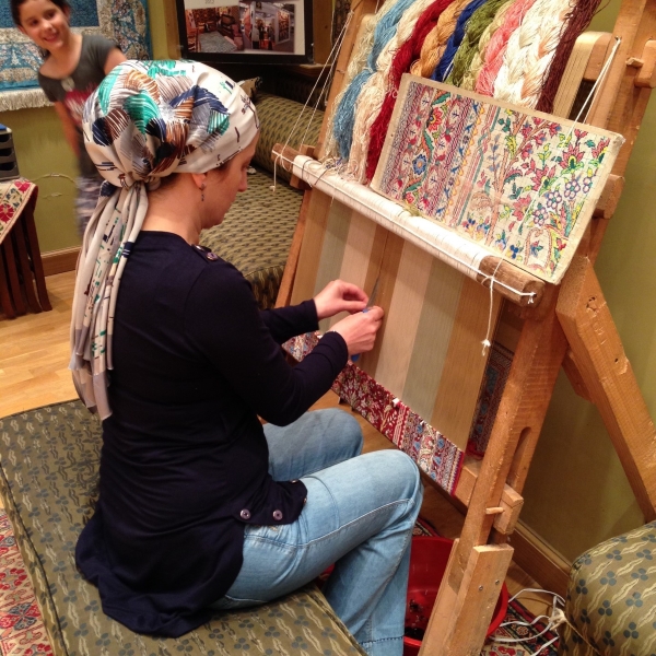 Hand weaving carpets in Turkey